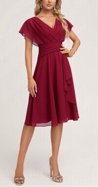 Get ready to turn heads in this stunning burgundy dress from JJs House!